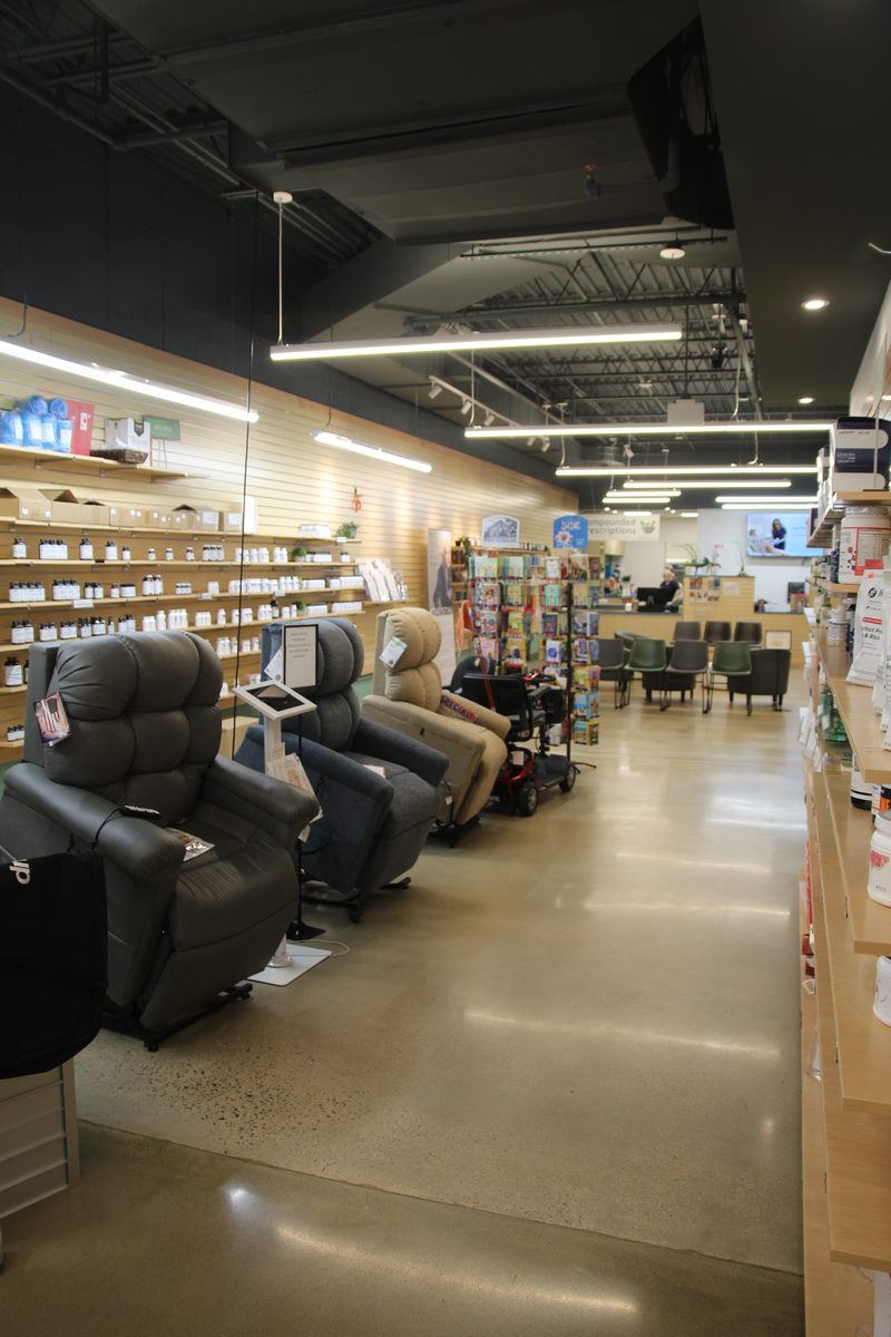 Golden lift chairs and recliners on display in the showroom
